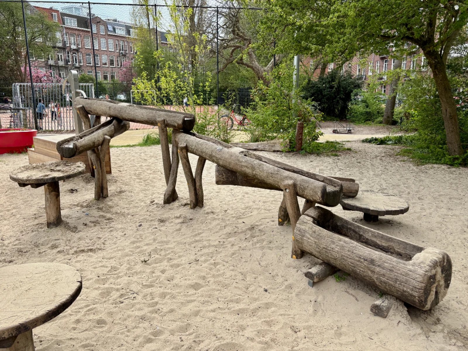 Wooden troughs for water play on sand